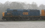 CSX Business train in pouring rain